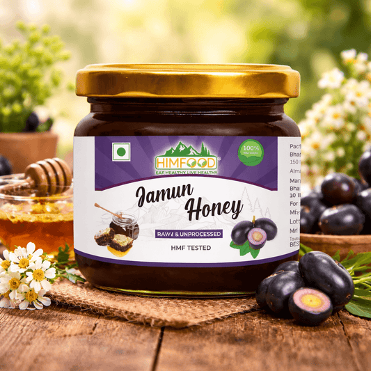 Himalayan jamun honey jar raw and unprocessed honey with fresh jamun fruits on wooden table