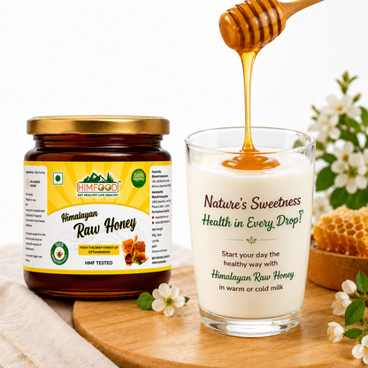 HIMFOOD Himalayan Raw Honey in glass jar with pure honey drizzling into a glass of milk – unprocessed, unheated, HMF tested raw honey from Uttarakhand