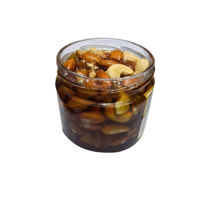 Jamun Honey with dryfruits combo featuring a jar of mixed dry fruits with almonds and cashews.