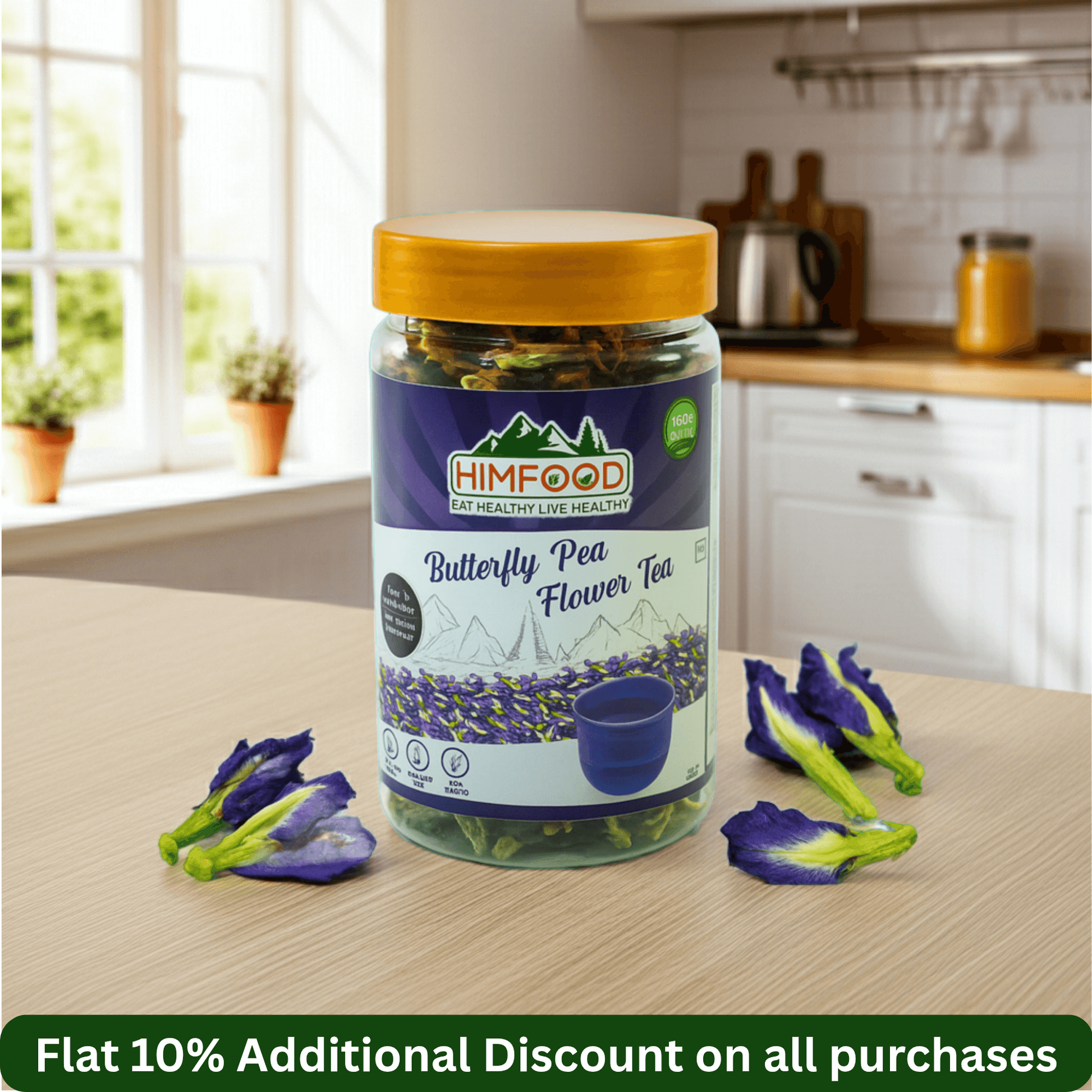 Himalayan butterfly pea flower tea 25g jar on kitchen counter with blue butterfly pea flowers nearby.