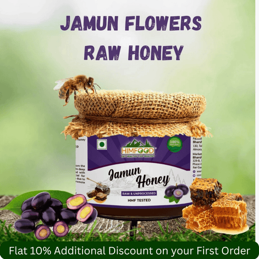 Himalayan Jamun Flower Raw Honey jar with jamun flowers and honeycomb in background.